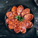 Chorizo Iberico sliced and in a plate